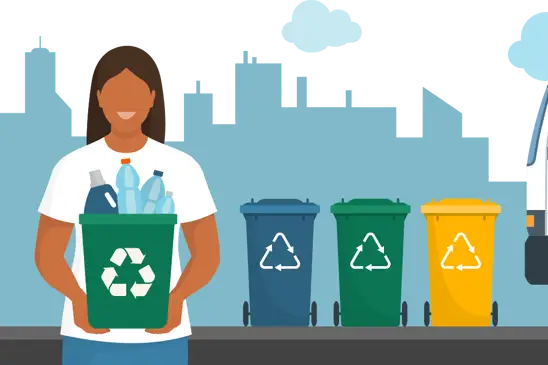 Woman holding a box of recycling in front of a row of coloured wheelie bins